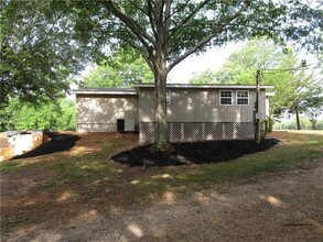 7136 Jake Kemp Rd in Murrayville, GA - Building Photo - Building Photo