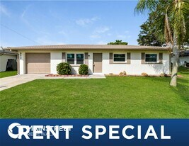 893 Riviera Ln NW, Unit BE in Port Charlotte, FL - Building Photo