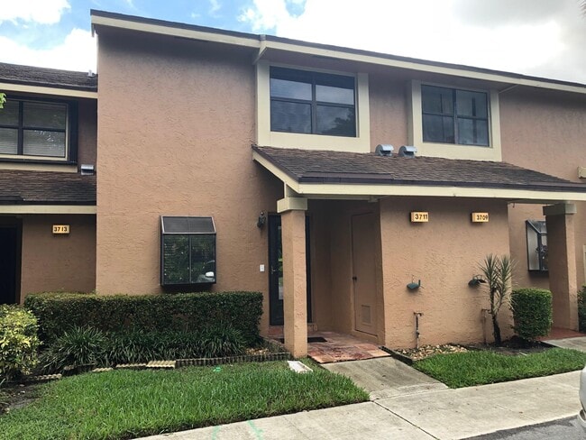 property at 3711 Carambola Cir N