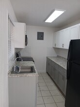 1917 Smith Dr, Unit 1 in North Palm Beach, FL - Building Photo - Building Photo