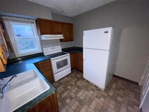 207 Newell Dr in Ferguson, MO - Foto de edificio - Building Photo