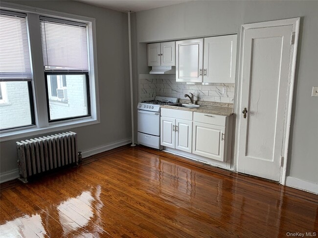 property at 215 E Broadway