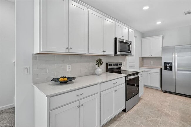 27823 Solis Grande Dr in Bonita Springs, FL - Foto de edificio - Building Photo