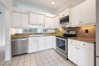 4130 Looking Glass Ln in Naples, FL - Building Photo - Building Photo