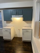 4872 W Homer St, Unit 1st Floor in Chicago, IL - Foto de edificio - Building Photo