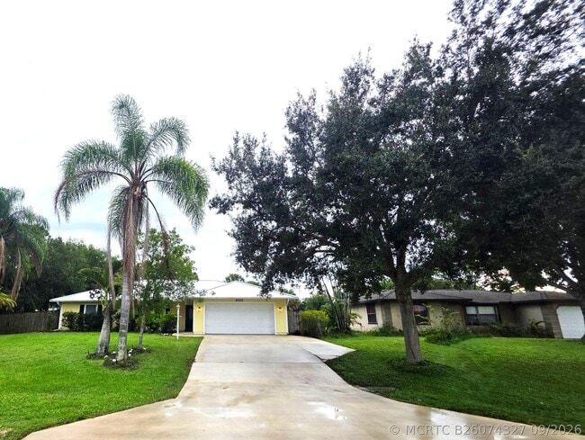 property at 6707 Coquina Ave
