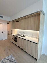 225 N Miami Ave, Unit SI FL25-ID1461461P in Miami, FL - Building Photo - Building Photo