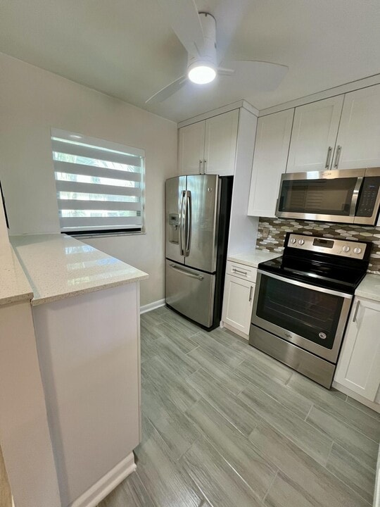 7142 Golf Colony Ct in Greenacres, FL - Building Photo