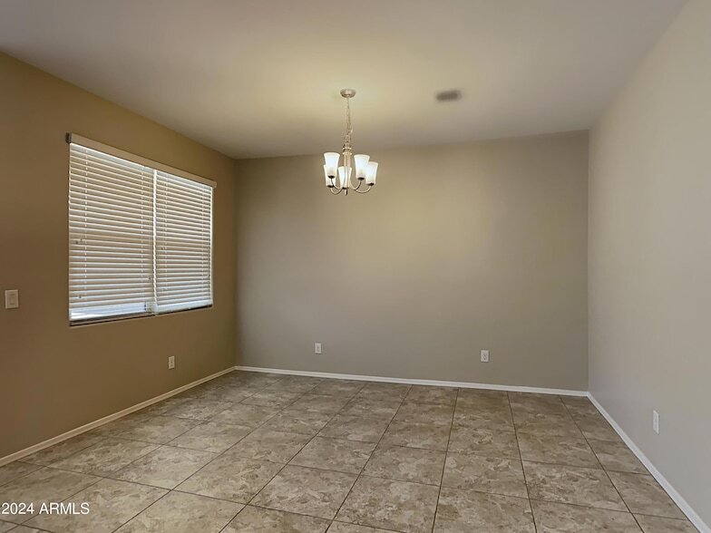 36965 W Mediterranean Way, Unit A1L in Maricopa, AZ - Building Photo