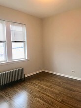 7153 W Grand Ave-Unit -202 in Chicago, IL - Building Photo - Building Photo