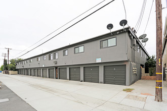 Green Apartments in Los Alamitos, CA - Building Photo - Building Photo