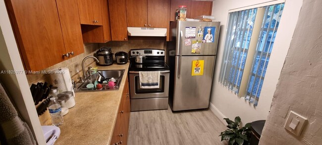 property at 7230 NW 3rd St