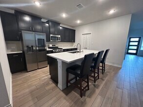 822 Pepperbark Loop in Mustang Ridge, TX - Building Photo - Building Photo