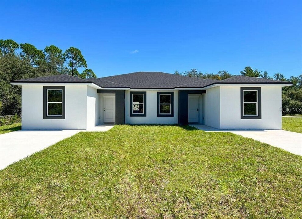 856 Glastonbury Dr in Poinciana, FL - Building Photo