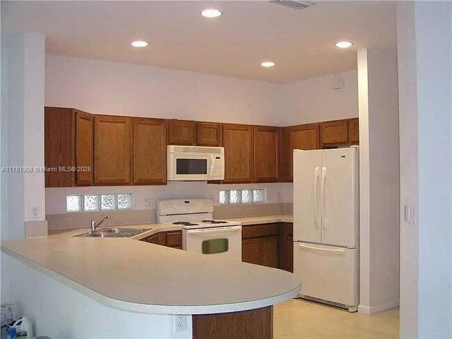 1309 Alicante Ct in Riviera Beach, FL - Foto de edificio - Building Photo