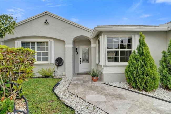 property at 11761 NW 12th St