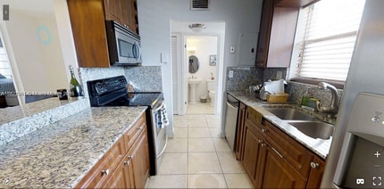 7705 Abbott Ave, Unit 303 in Miami Beach, FL - Foto de edificio - Building Photo