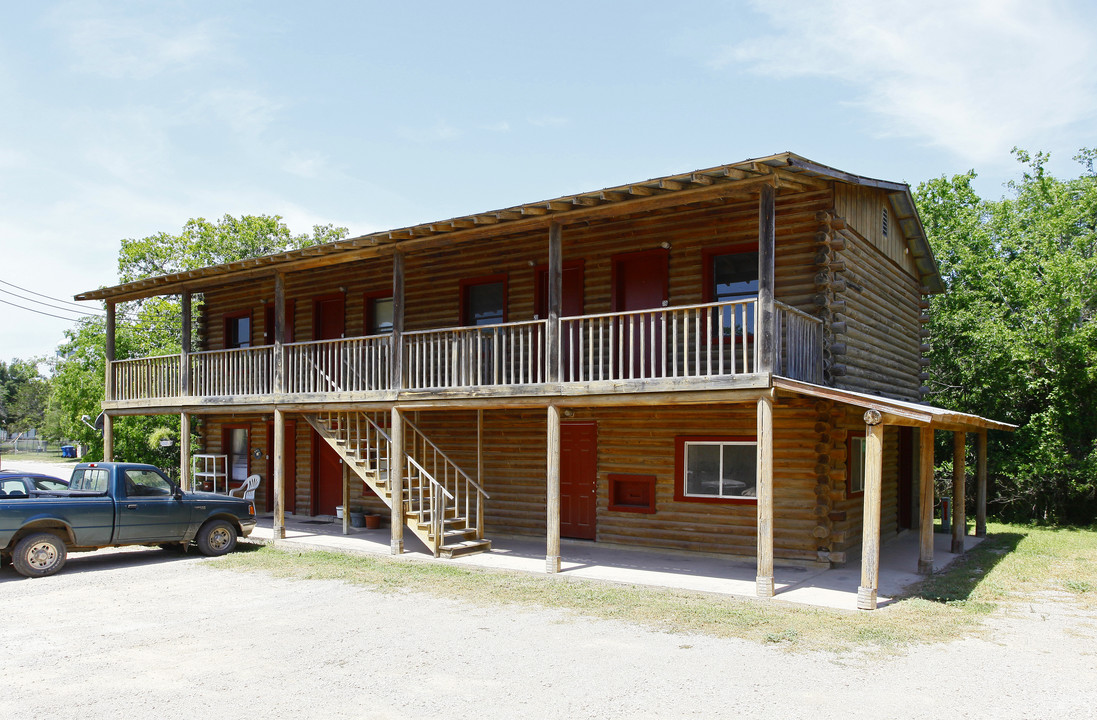 Log Cabin Apartments in Bandera, TX - Building Photo