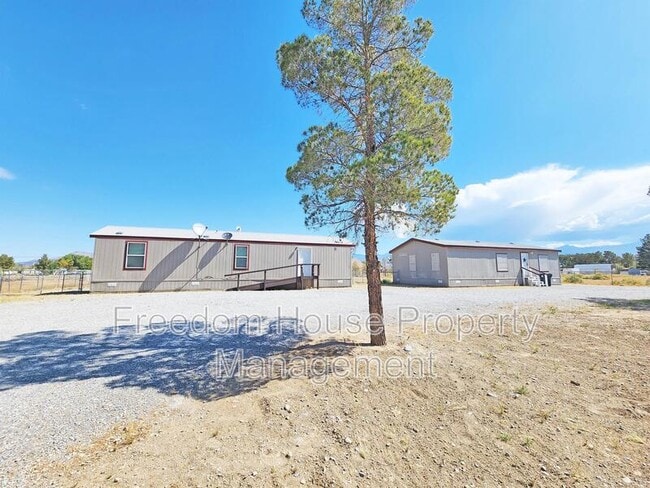 1550 W Irons St in Pahrump, NV - Building Photo - Building Photo