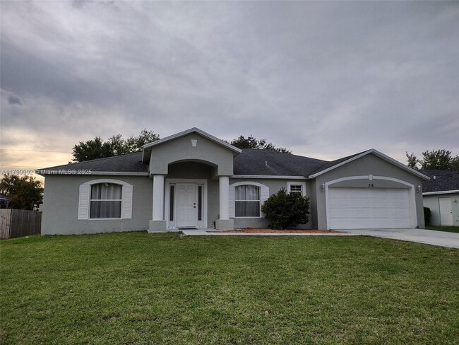 property at 316 SW Kestor Dr