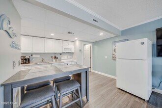 6903 N Lagoon Dr in Panama City Beach, FL - Building Photo - Building Photo