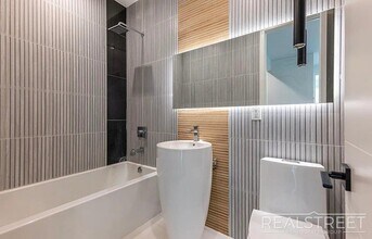 Spacious 2 Bed 2 Bath in Prospect Lefferts Gardens - Rooftop Access & More! in Brooklyn, NY - Building Photo - Building Photo