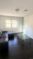 1318 Post Ave in Elmont, NY - Building Photo