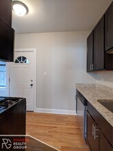 4036 N Ashland Ave, Unit E1 in Chicago, IL - Building Photo - Building Photo