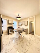 10 Bucknam St, Unit 1 in Boston, MA - Building Photo - Building Photo