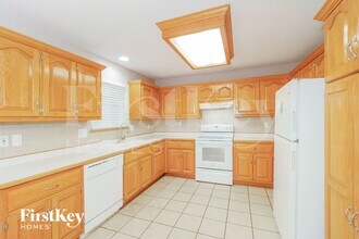 208 S Darrowby Dr in Raymore, MO - Building Photo - Building Photo