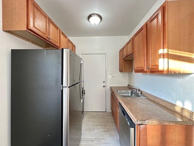 939 W Sunnyside Ave, Unit 2S in Chicago, IL - Foto de edificio - Building Photo