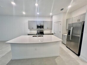 1287 Axel Graeson Ave in Kissimmee, FL - Building Photo - Building Photo