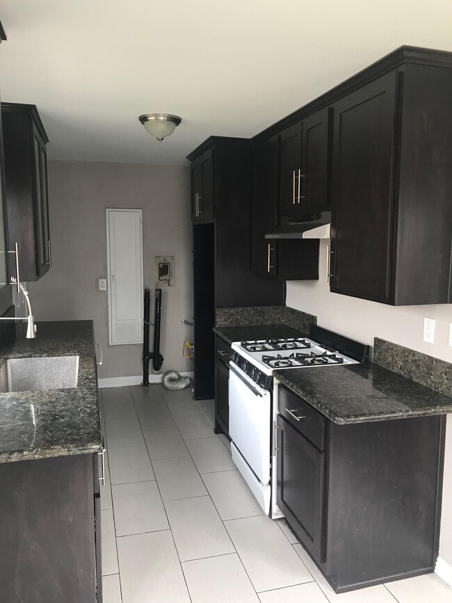 property at 1241 W 102nd St
