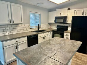 5727 W Pacific Park Dr in Spokane, WA - Building Photo - Building Photo