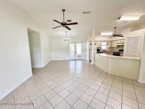 7746 Mango Grove Ave in Melbourne, FL - Building Photo - Building Photo