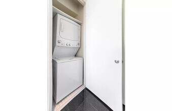 59 John St, Unit 21E in New York, NY - Building Photo - Building Photo