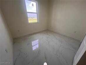 1598 Gretchen Ave S in Lehigh Acres, FL - Building Photo - Building Photo