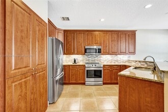 6504 NW 78th Pl in Parkland, FL - Building Photo - Building Photo