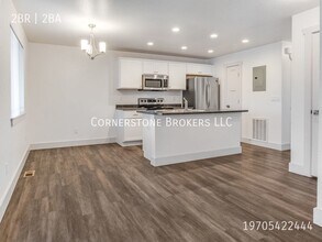 100 Parkview Ct-Unit -C in Wiggins, CO - Building Photo - Building Photo