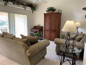 2875 Cypress Trace Cir-Unit -8-203 in Naples, FL - Building Photo - Building Photo