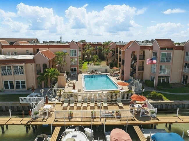 8911 Blind Pass Rd, Unit 308 in St Pete Beach, FL - Building Photo - Building Photo