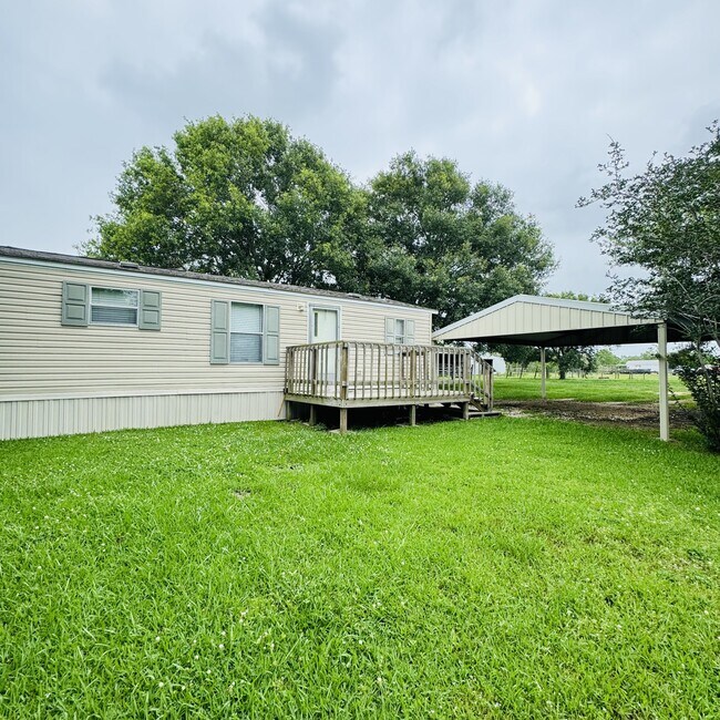 14138 Shellhammer Rd in Winnie, TX - Building Photo - Building Photo