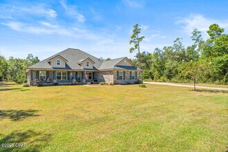 104 Lake Merial Trail in Southport, FL - Building Photo - Building Photo