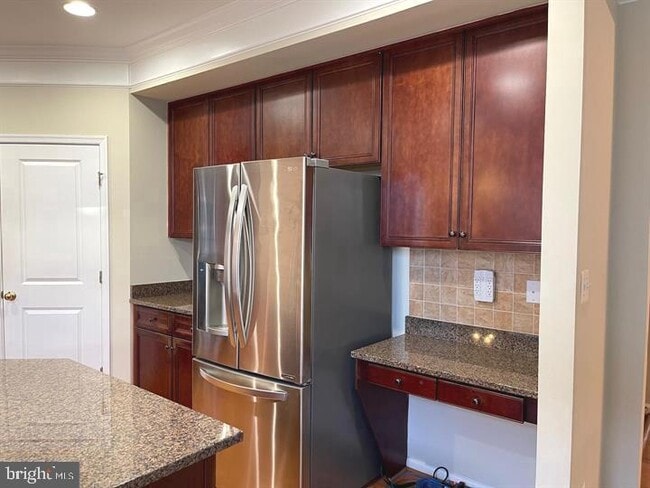 12313 Tanalian Falls Ln in Linton Hall, VA - Building Photo - Building Photo