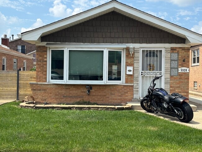 property at 5920 S Meade Ave
