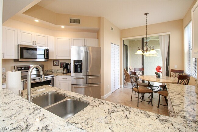 property at 7024 Pelican Bay Blvd