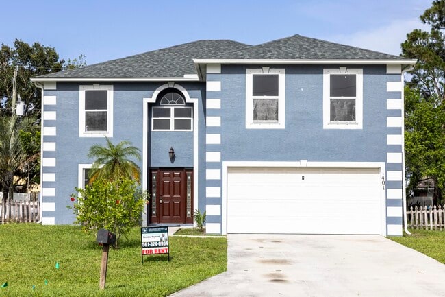 1401 SW Heather St in Port St. Lucie, FL - Building Photo - Building Photo