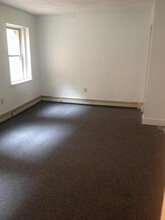 1673 Commonwealth Ave, Unit #1 in Boston, MA - Foto de edificio - Building Photo