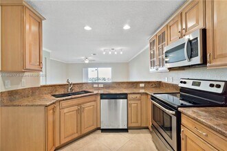 5905 Abbey Rd in Tamarac, FL - Building Photo - Building Photo
