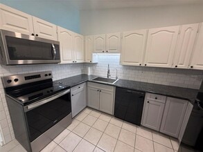 512 Dewhurst St in Port Charlotte, FL - Building Photo - Building Photo